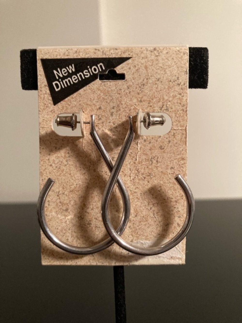 New Dimension Silver Twisted Hoop Earrings